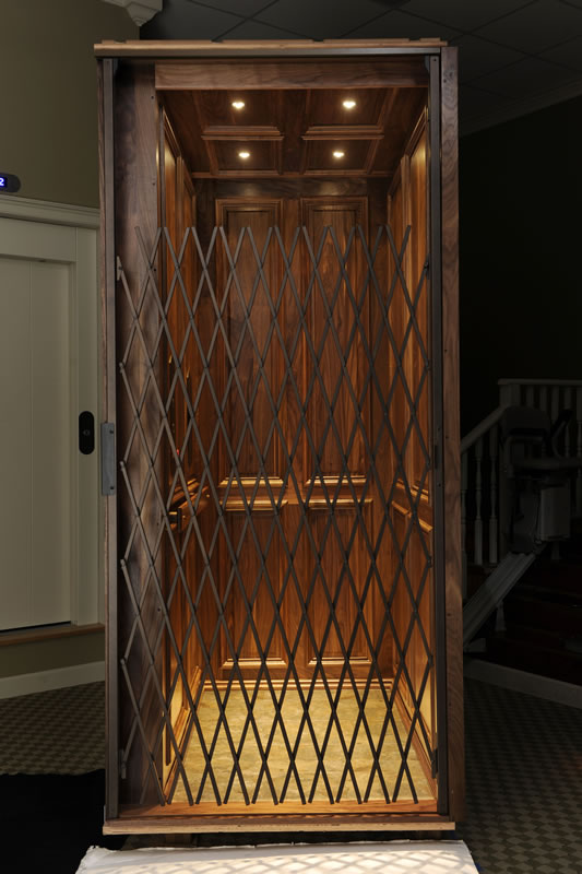 Symmetry Raised Cab Custom Elevator with Scissor gate from HomeLift