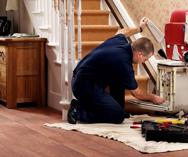Homelift Technician Installing a straight stairlift